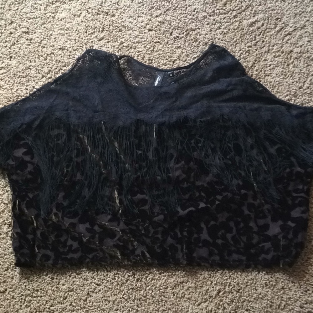 Buckle Boutique short sleeved sheer top!